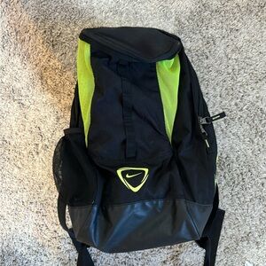 Nike Black and Green Backpack with Durable Fabric and Reflective Logo